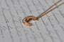 Collier Collier demi-lune en or rose 18K et diamants 58 Facettes