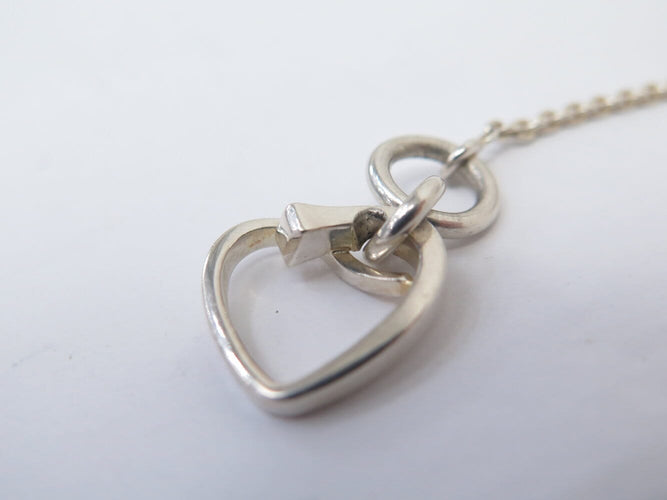 Collier Hermès Amulette Cœur - Collier en argent massif et diamant 58 Facettes 275840