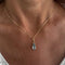 Collier Collier avec pendentif en or jaune et aigue-marine 58 Facettes 40531