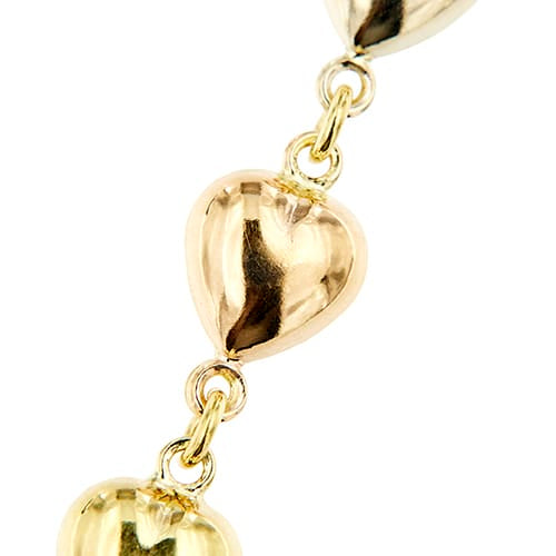 Bracelet Bracelet à cœurs en trois ors 58 Facettes 41400