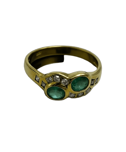Bague 55 Anello sinueux en or jaune avec émeraudes et diamants 58 Facettes