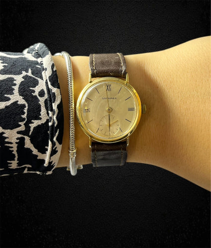 Montre Longines - Montre vintage en or jaune 58 Facettes
