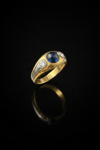 Bague 56 Bague - zaffiro cabochon et diamants en or jaune 58 Facettes