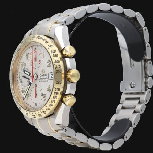 Omega Speedmaster - Montre Date en or jaune et acier 58 Facettes MT47161
