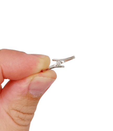 Bague solitaire vintage en or blanc 18k et diamant