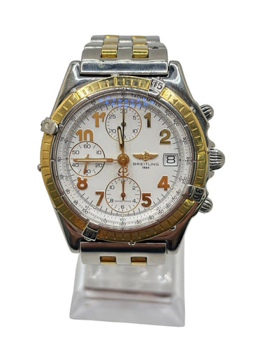 Breitling Chronomat - Montre en or et acier 58 Facettes 2036