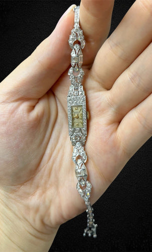 Montre Astin - Montre bracelet Art déco en or blanc 18 carats et diamants 58 Facettes