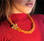 Collier Collier en corail avec fleur dorée 58 Facettes