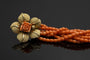 Collier Collier en corail avec fleur dorée 58 Facettes