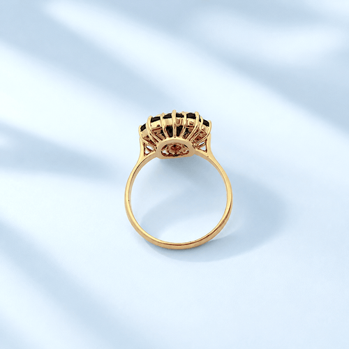 55 Bague marguerite en or jaune 18K et grenats 58 Facettes 1789