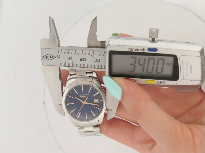 Longines Conquest Classic - Montre 34 mm en acier quartz 58 Facettes 275811