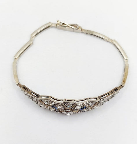 Bracelet Art déco en or blanc, platine, diamants et saphirs 58 Facettes A07544