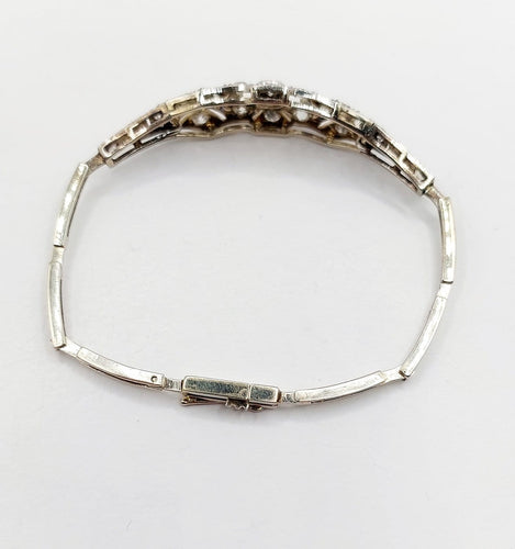 Bracelet Art déco en or blanc, platine, diamants et saphirs 58 Facettes A07544