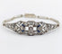 Bracelet Art déco en or blanc, platine, diamants et saphirs 58 Facettes A07544