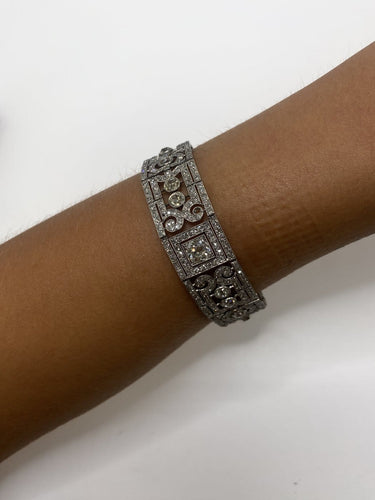 Art déco - Bracelet articulé en platine et diamants 58 Facettes SKU DO/090726