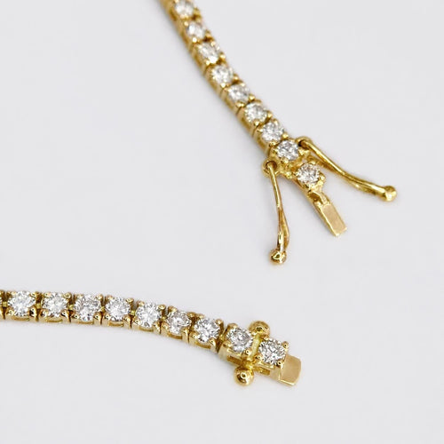 Embrace - Bracelet tennis en or 18 carats et diamants 58 Facettes GBT1261YG