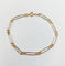 Bracelet vintage maille Figaro en or blanc et jaune 18k 58 Facettes A07559