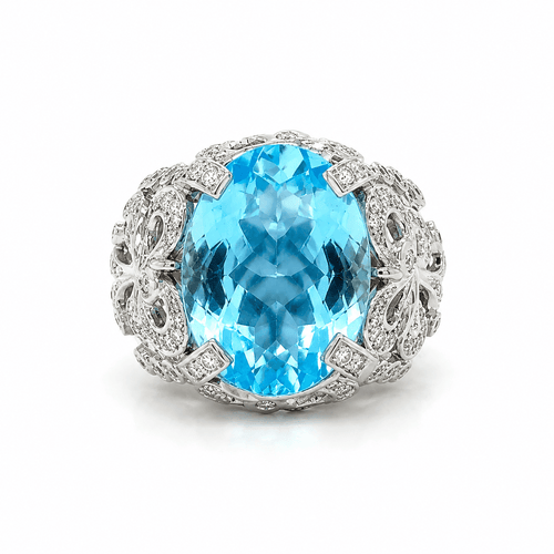 55 Bague en or blanc, topaze et diamants 58 Facettes 1.0000076/2