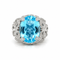 55 Bague en or blanc, topaze et diamants 58 Facettes 1.0000076/2