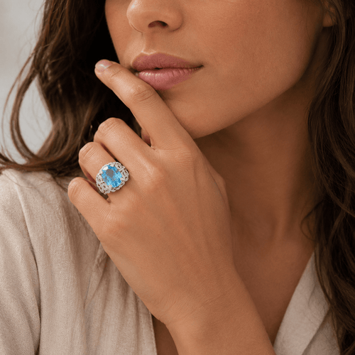 55 Bague en or blanc, topaze et diamants 58 Facettes 1.0000076/2