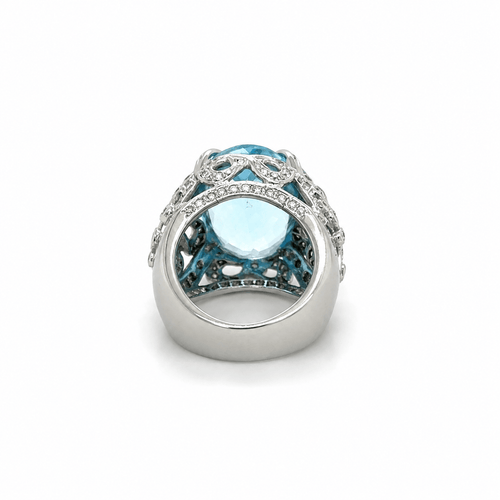 55 Bague en or blanc, topaze et diamants 58 Facettes 1.0000076/2