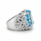 55 Bague en or blanc, topaze et diamants 58 Facettes 1.0000076/2