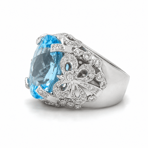 55 Bague en or blanc, topaze et diamants 58 Facettes 1.0000076/2
