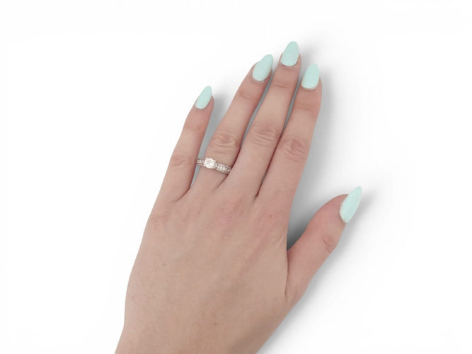 53 Bague solitaire en or blanc 18k et diamants 58 Facettes 275909