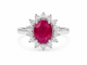 54 Bague entourage en or blanc, rubis et diamants 58 Facettes 32239
