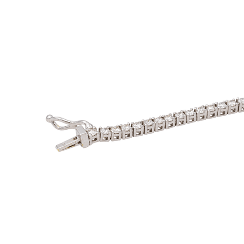 Bracelet ligne en or blanc et diamants 58 Facettes 5990507RV