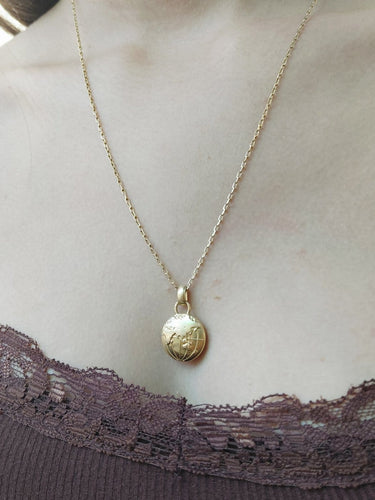 Pendentif globe terrestre en or jaune 58 Facettes 1793059