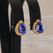 Boucles d'oreilles en or jaune 18 ct, tanzanites GFCO et diamants 58 Facettes E0033
