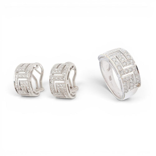 54 Parure bague et boucles d'oreilles en or 18 carats et diamants 58 Facettes E61