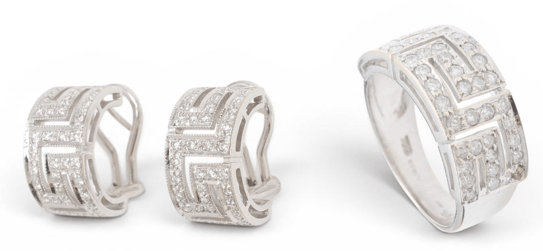 54 Parure bague et boucles d'oreilles en or 18 carats et diamants 58 Facettes E61