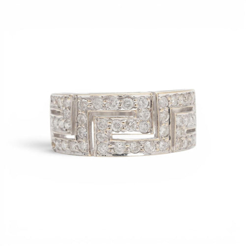 54 Parure bague et boucles d'oreilles en or 18 carats et diamants 58 Facettes E61