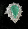 51 Bague en or blanc 18 carats, émeraude poire et diamants 58 Facettes Bague 5