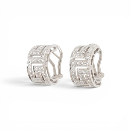 57 Parure géométrique - Bague et boucles d'oreilles en or blanc et diamants 58 Facettes E62