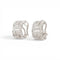 57 Parure géométrique - Bague et boucles d'oreilles en or blanc et diamants 58 Facettes E62