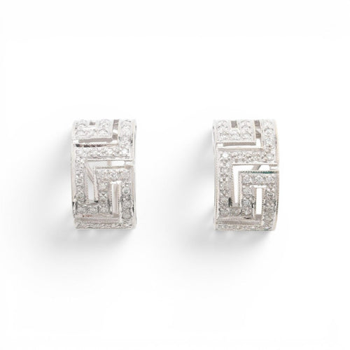 57 Parure géométrique - Bague et boucles d'oreilles en or blanc et diamants 58 Facettes E62
