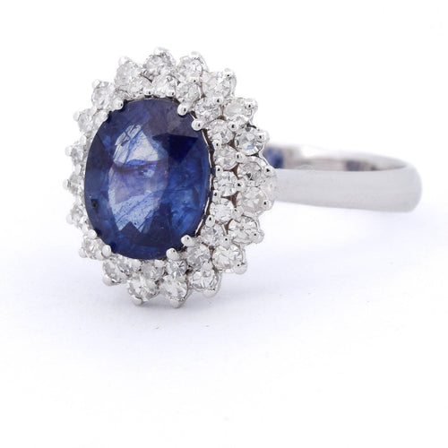 56 Bague en or blanc 18 kt avec saphir et diamants 58 Facettes AN537 (00119)