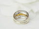 52 Bague triple jonc en or bicolore et diamants 58 Facettes 33502