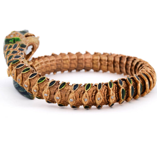 Bracelet vintage serpent en or 14 kt avec diamants et rubis 58 Facettes BR136 '(02459)