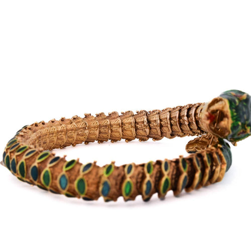 Bracelet vintage serpent en or 14 kt avec diamants et rubis 58 Facettes BR136 '(02459)