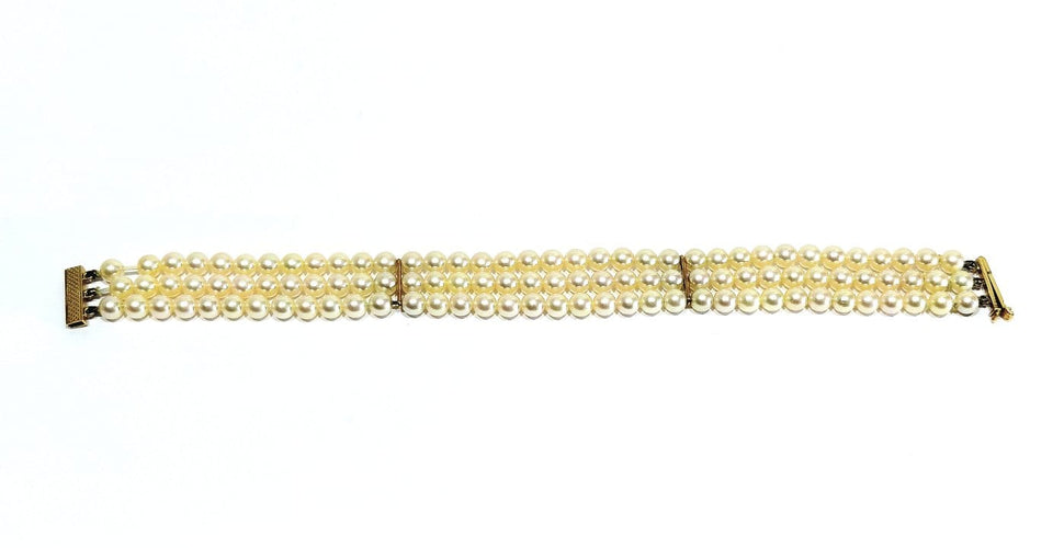 Bracelet en or jaune 18 carats et perles de culture 58 Facettes 1794592