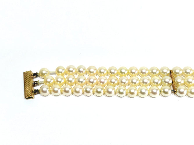 Bracelet en or jaune 18 carats et perles de culture 58 Facettes 1794592