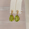 Parure boucles d'oreilles et pendentif en or jaune, péridots et diamants 58 Facettes S001