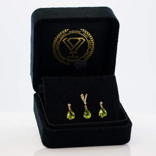Parure boucles d'oreilles et pendentif en or jaune, péridots et diamants 58 Facettes S001