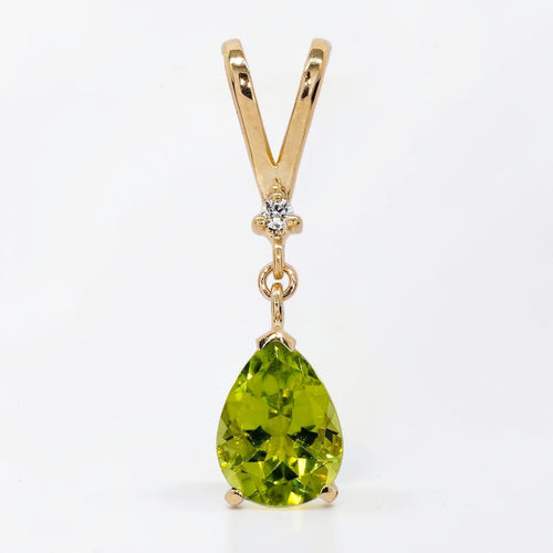 Parure boucles d'oreilles et pendentif en or jaune, péridots et diamants 58 Facettes S001