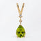 Parure boucles d'oreilles et pendentif en or jaune, péridots et diamants 58 Facettes S001