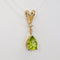 Parure boucles d'oreilles et pendentif en or jaune, péridots et diamants 58 Facettes S001